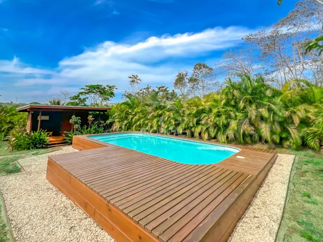 Turnkey Rental Opportunity: Charming Lodges with Pool Near Santa Teresa Beach