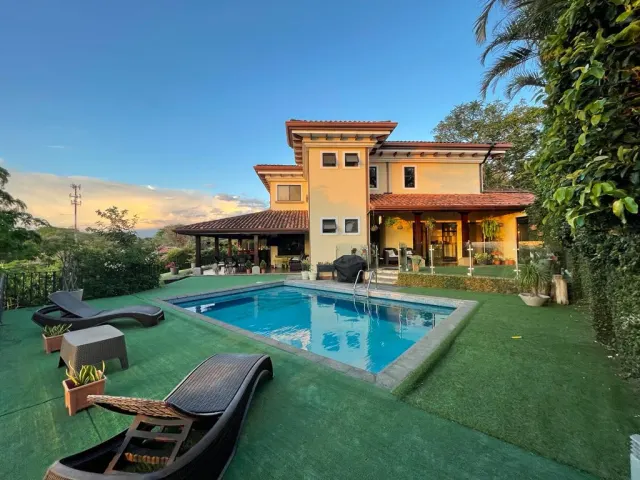 Exclusive Living: Impressive Gated Community Home with Sunset Views and Private Pool in Brasil de Santa